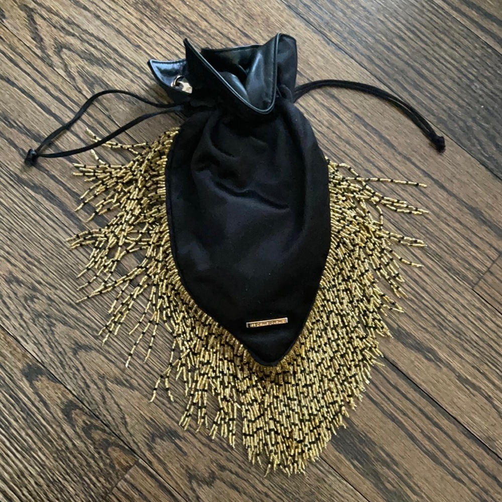 Le petite jouers fringe bag